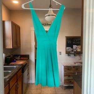 Sure cute turquoise mini! Never worn NWT!!